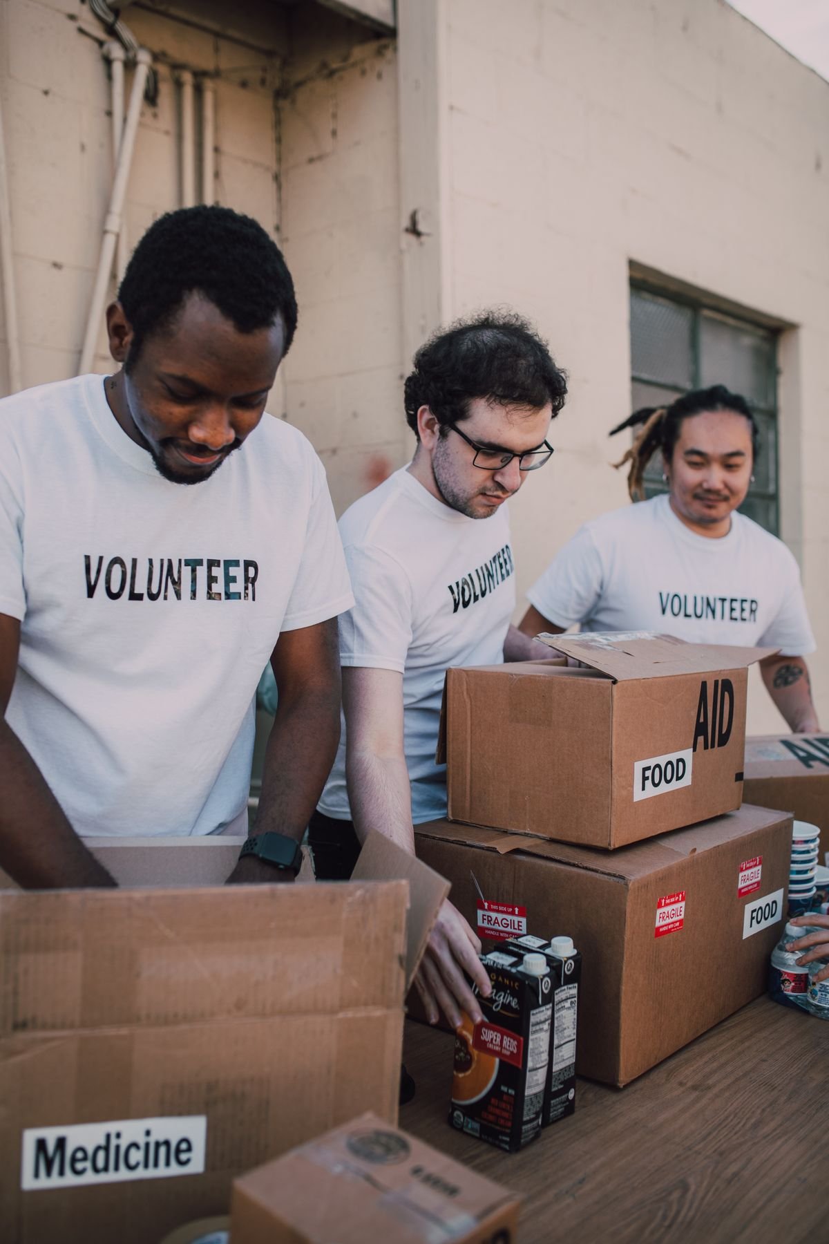 Volunteers preparing medical supplies