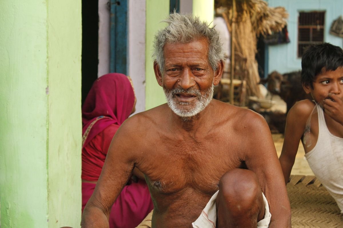 An elderly man in a village